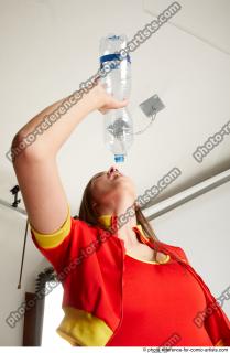 MARTINA BAYWATCH STANDING POSE WITH BOTTLE